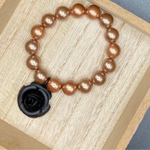 Handmade bracelet with a black rose charm